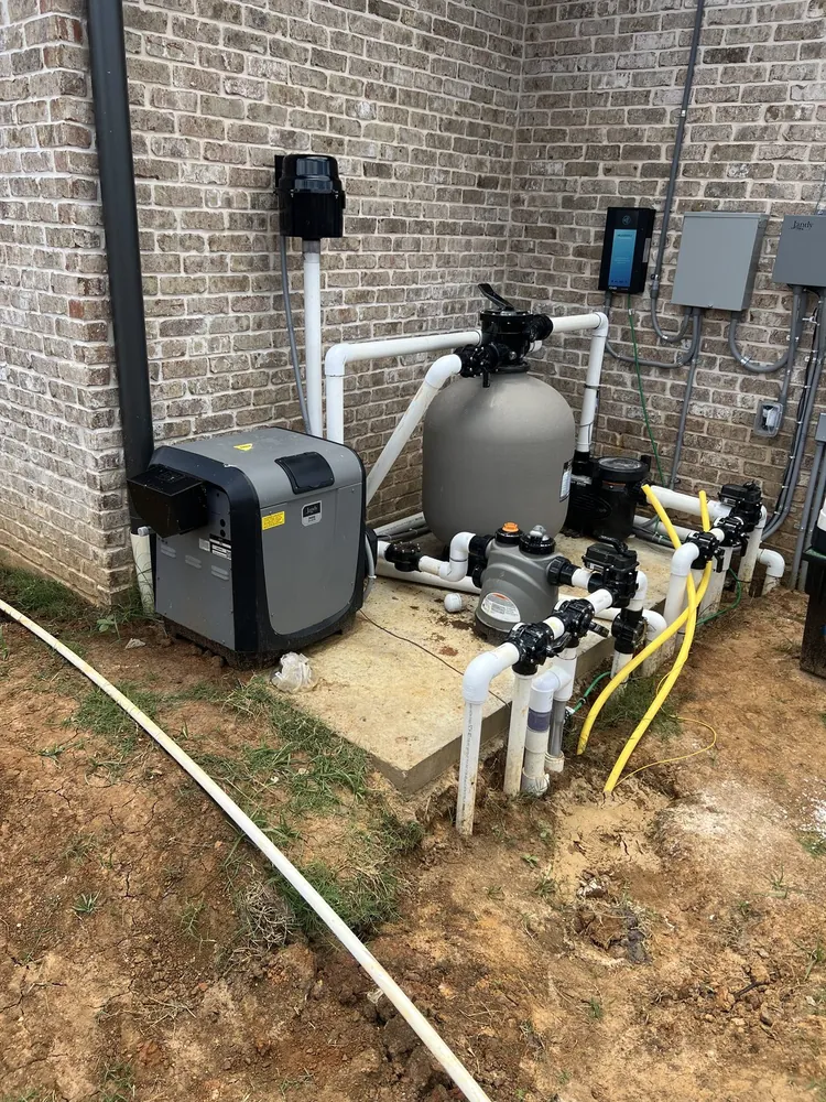 Gas line tie-in for a pool heater and fire pit on Roebuck Drive in Bullard, Texas