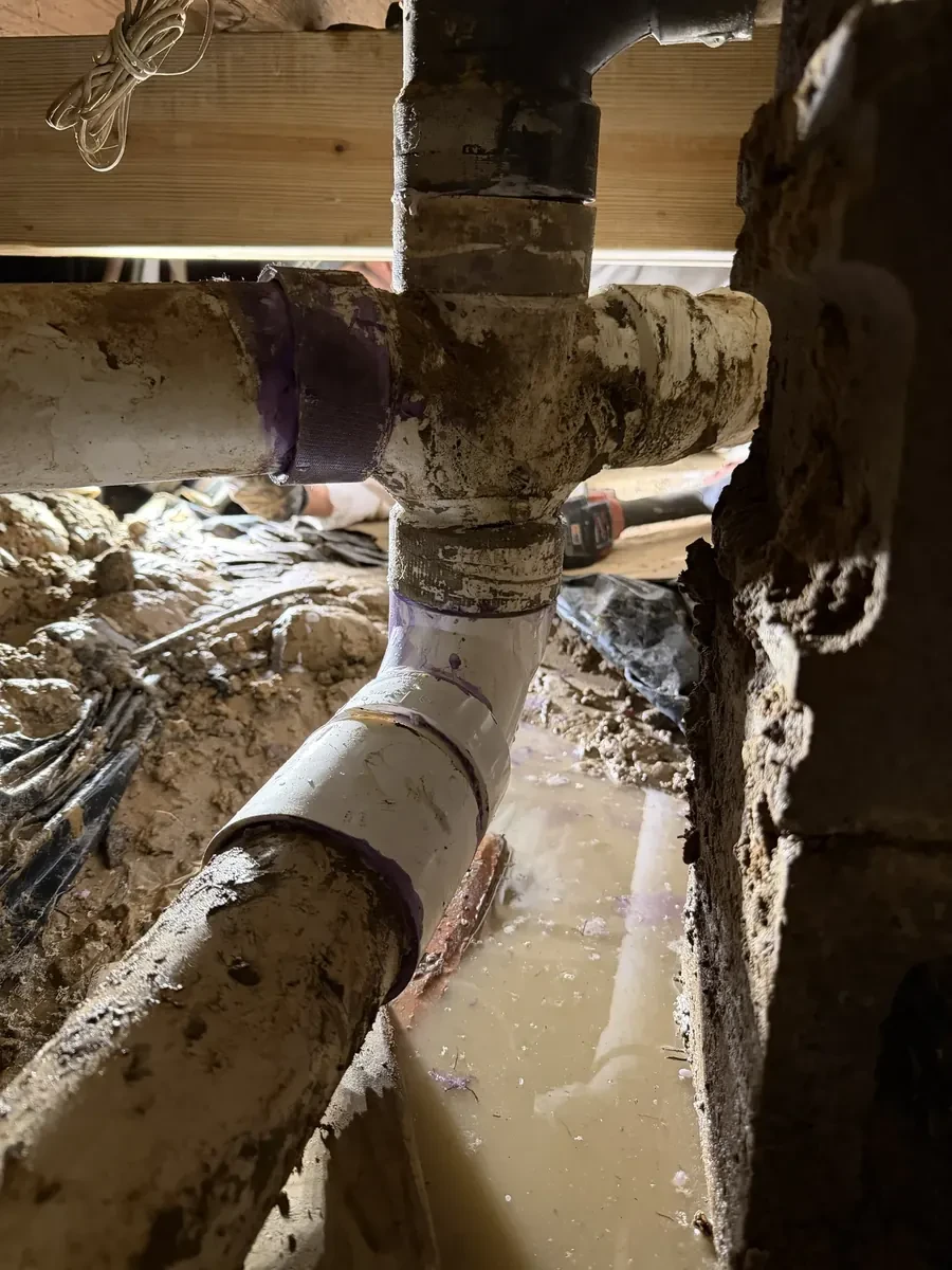 Broken sewer pipe under the house replaced on County Road 2121 in Longview, Texas