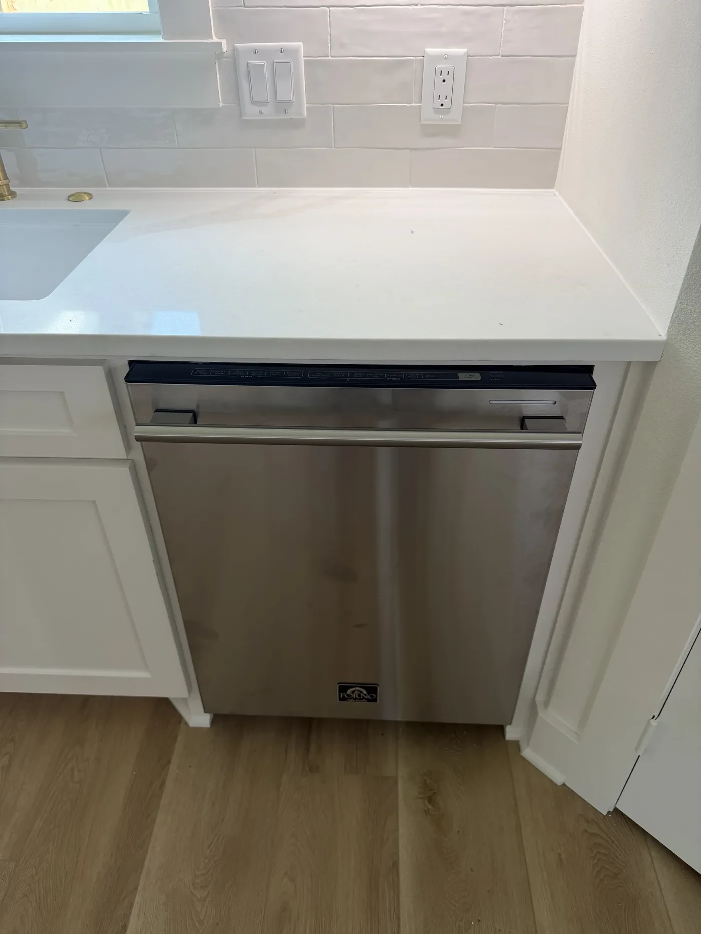 Dishwasher connected in a finished kitchen on Club Drive in Tyler, Texas