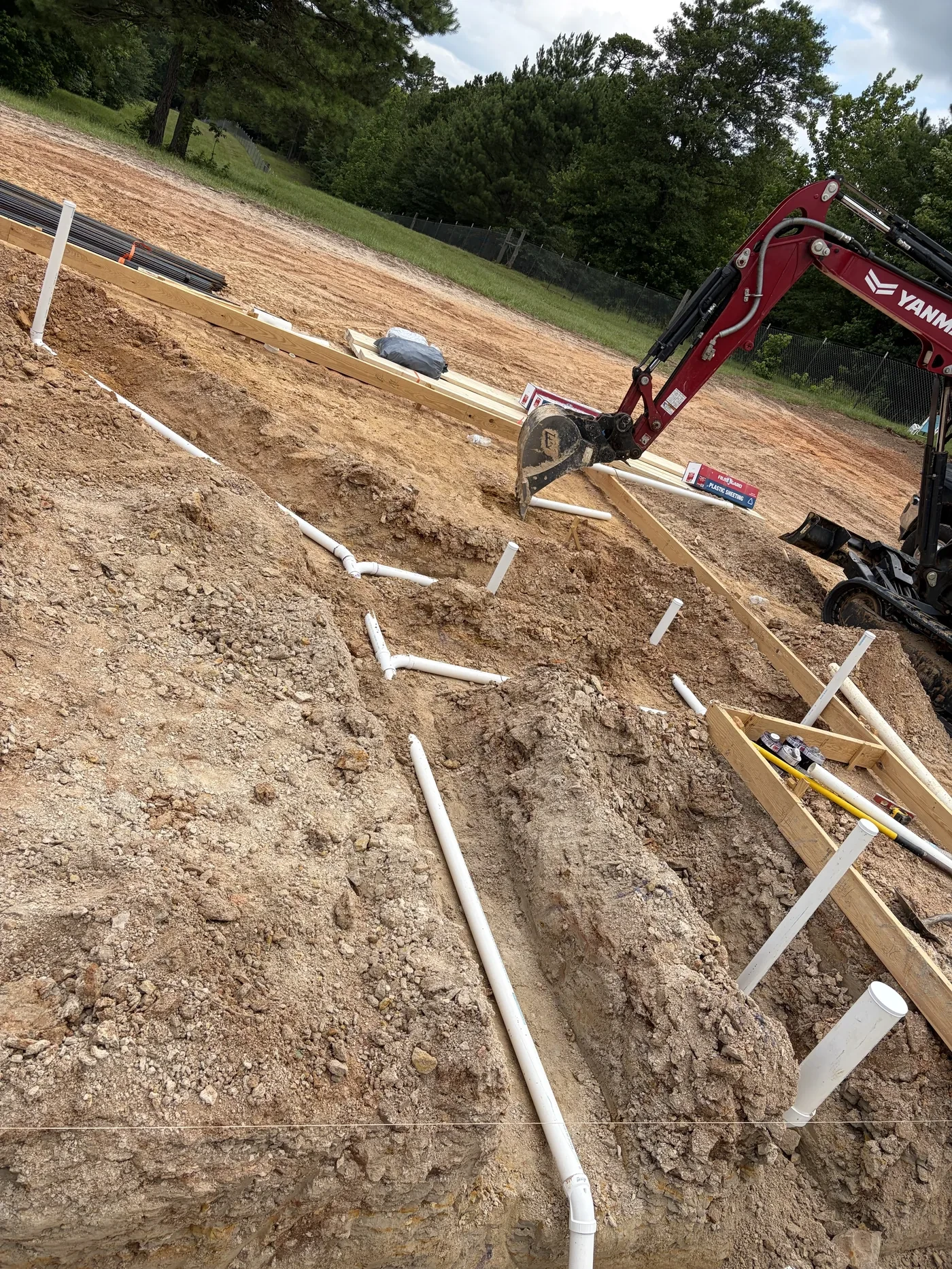 Underground plumbing laid in the trenches before the slab on Long Lane in Tyler, Texas
