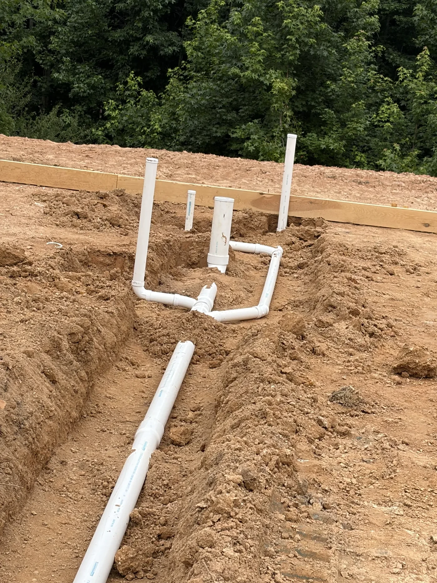 Underground rough-in in the trench on Long Lane in Tyler, Texas