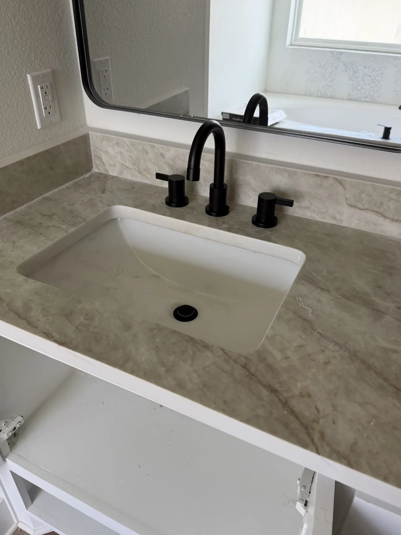 Second vanity faucet set at trim-out on Prince Place in Tyler, Texas