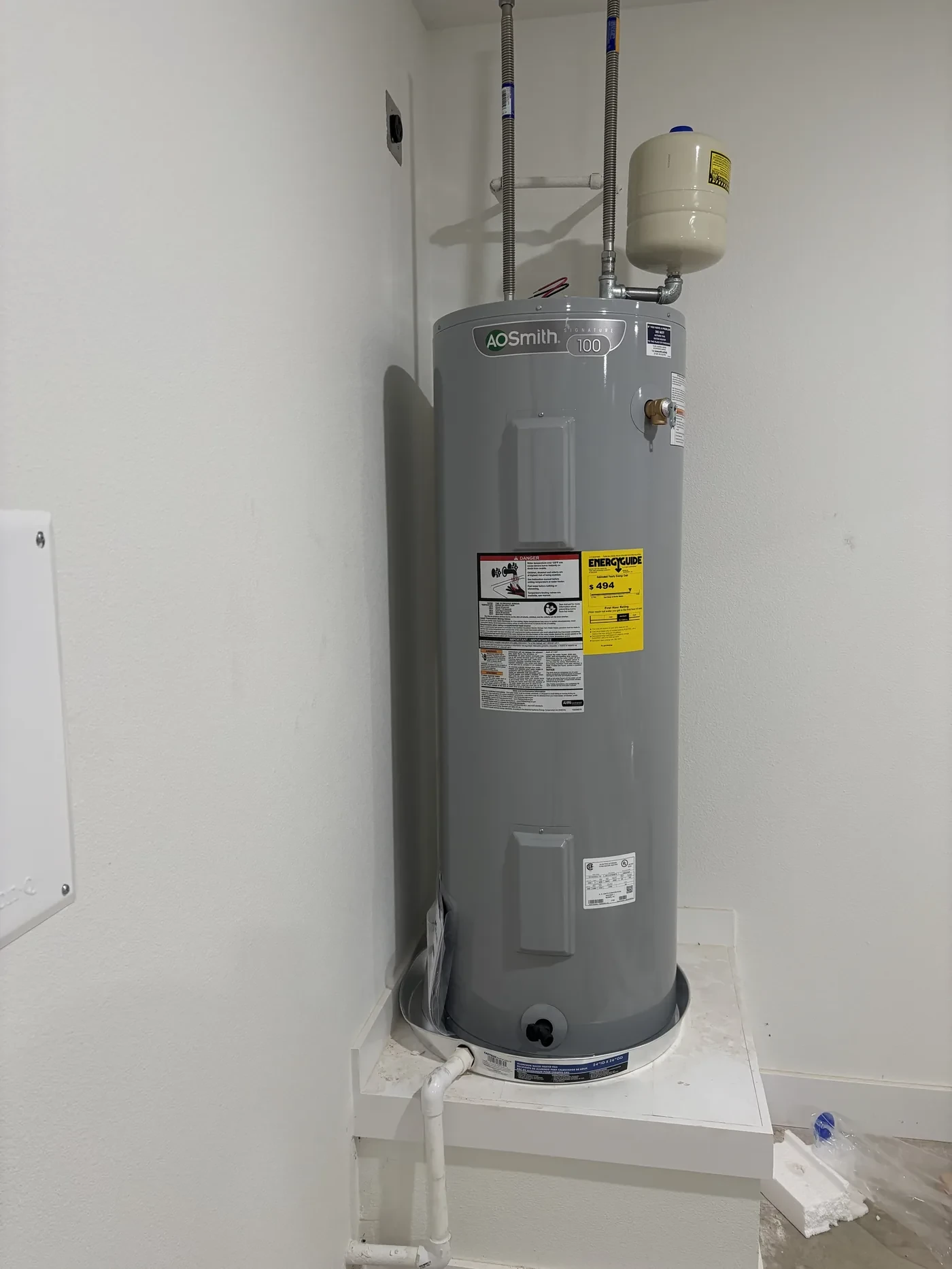 Electric water heater with expansion tank in a closet on Prince Place in Tyler, Texas
