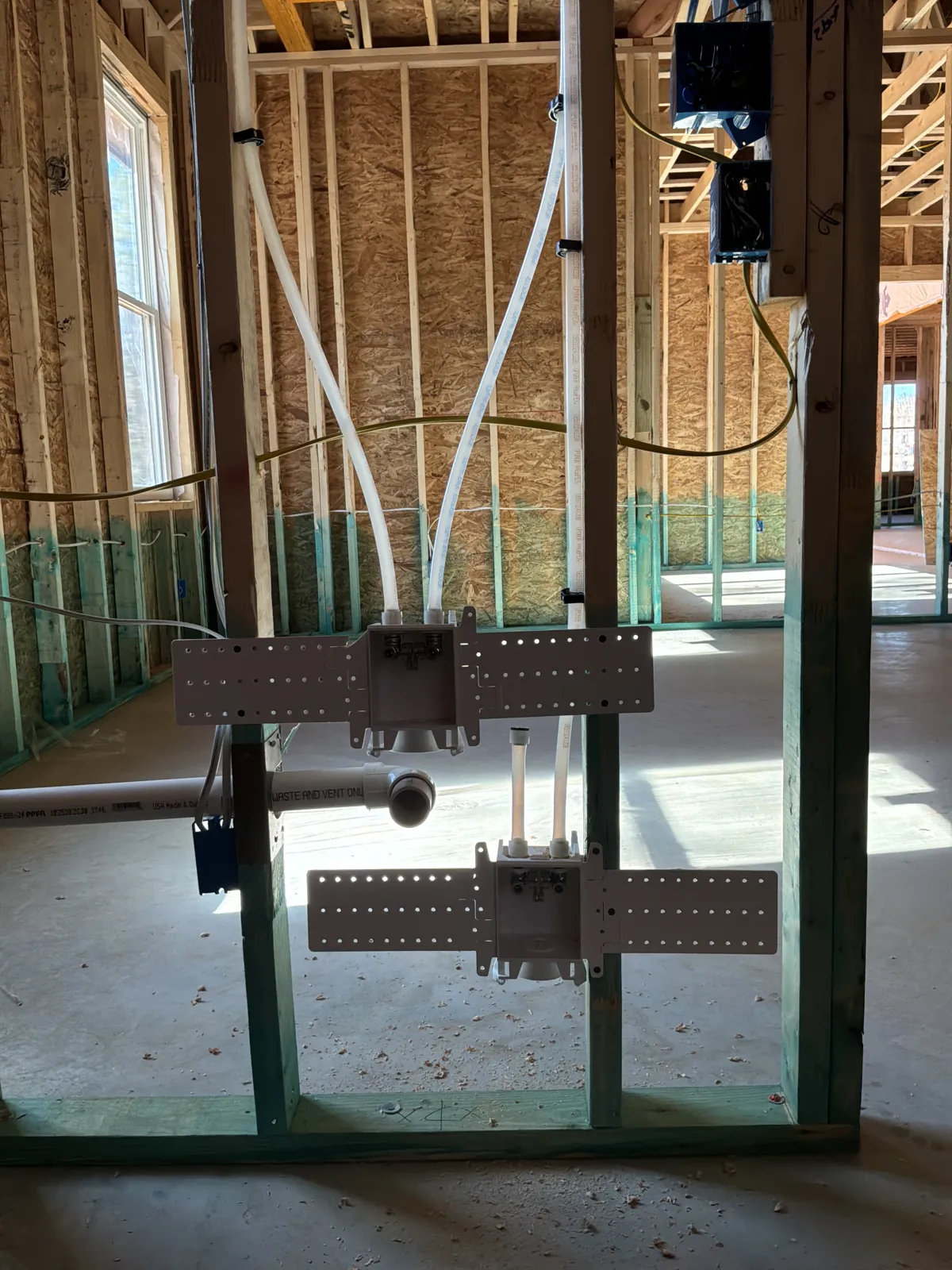 Shower and tub valves roughed in with PEX supply lines on Hidden Creek Trail, Legacy Bend, Tyler TX