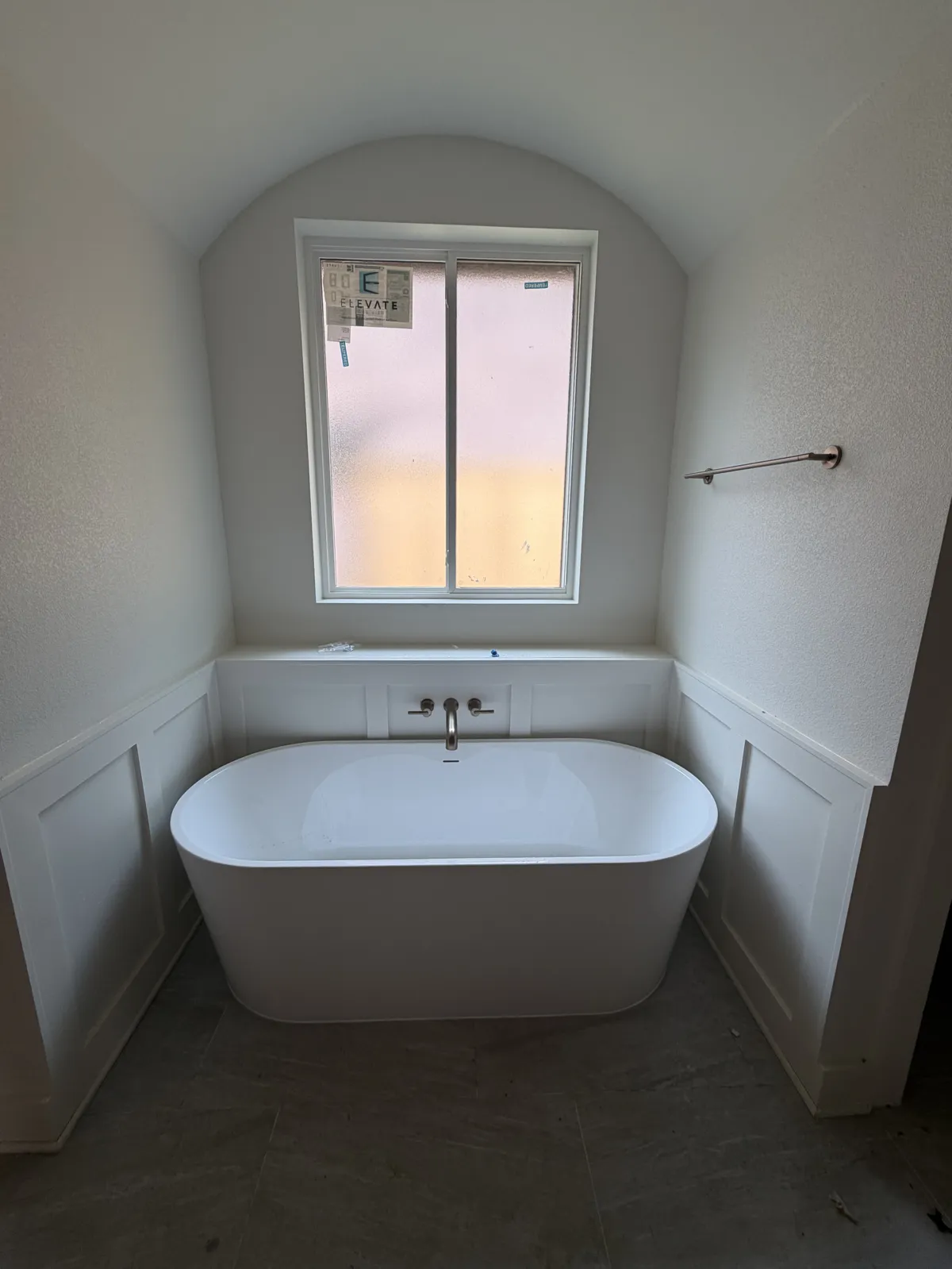 Freestanding tub with a wall-mounted faucet on Hidden Creek Trail, Legacy Bend, Tyler TX