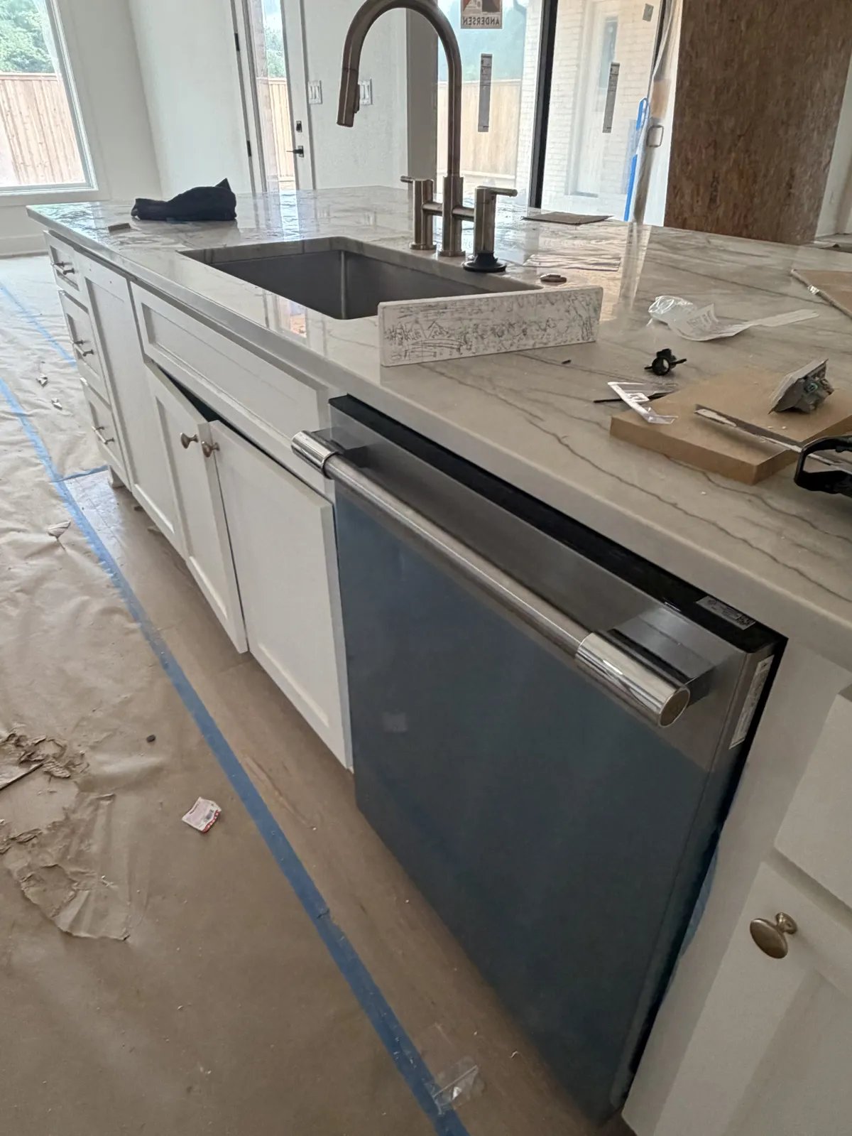 Kitchen island sink, faucet and dishwasher hookup on Hidden Creek Trail, Legacy Bend, Tyler TX