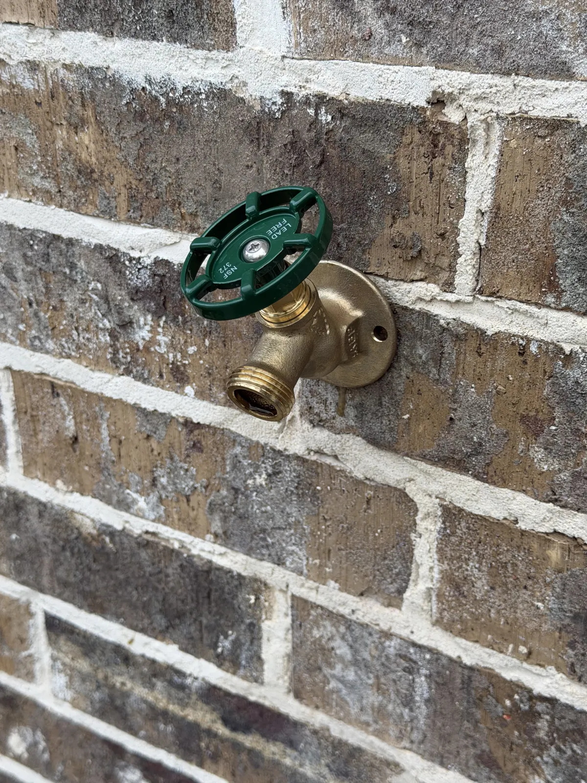 Exterior hose bib set in brick on Wilderness Cove, Legacy Bend, Tyler TX